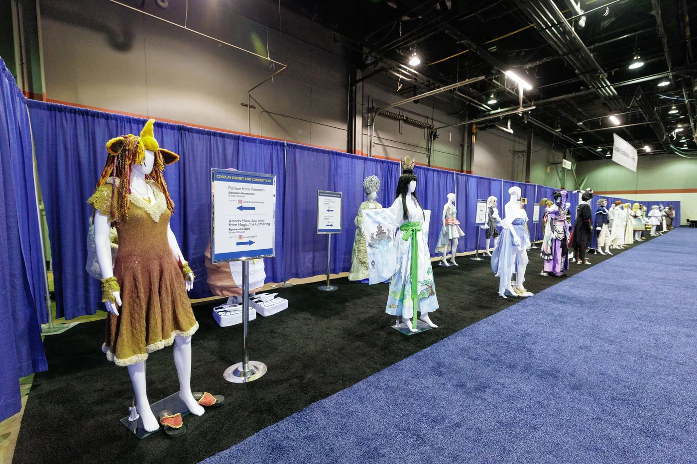 Competitors on stage at the h+h americas Cosplay Competition