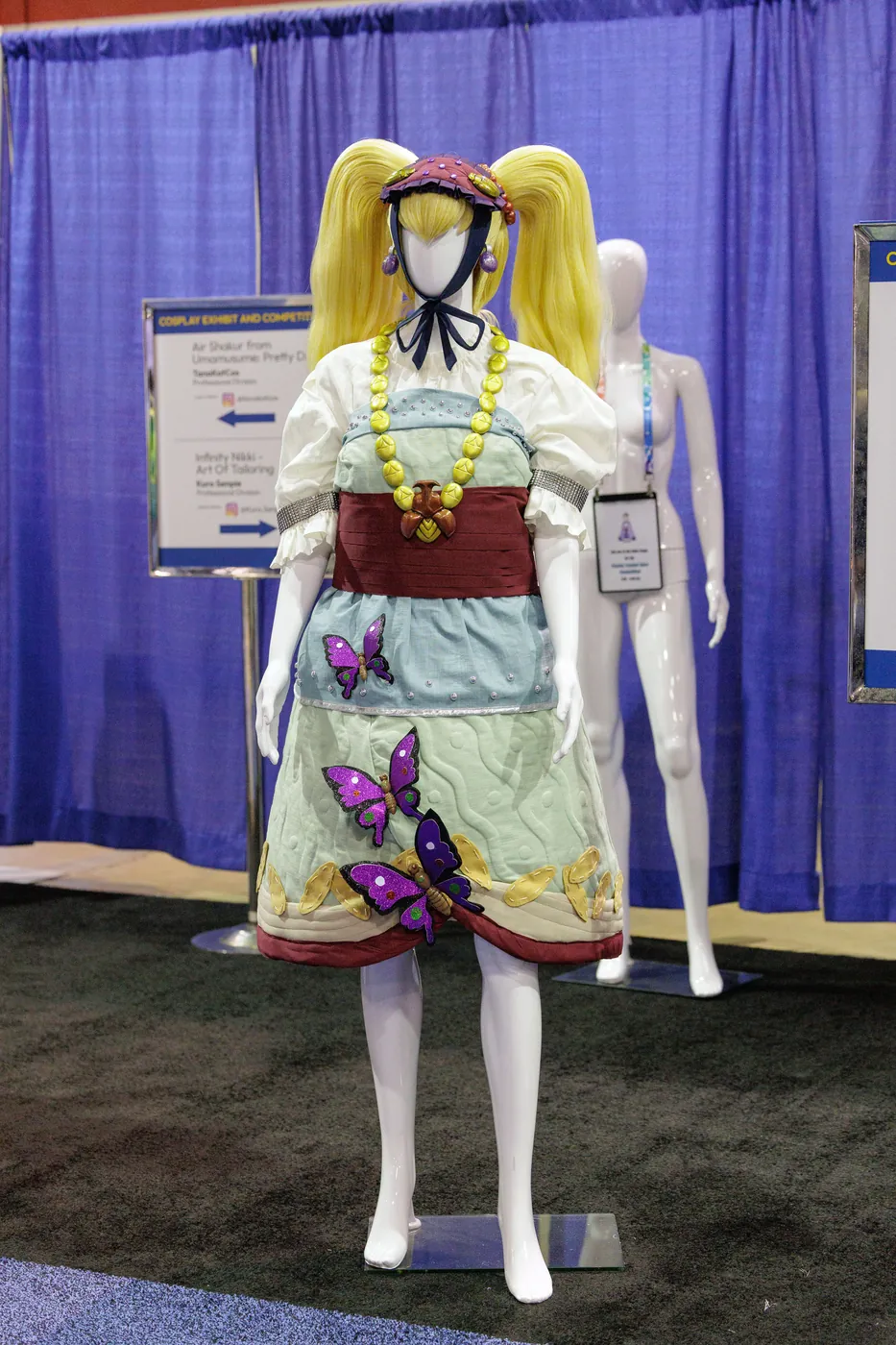 An exhibition costume on display at the h+h americas Cosplay Competition