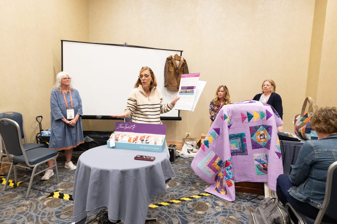 Makers at work in a hands-on sewing workshop