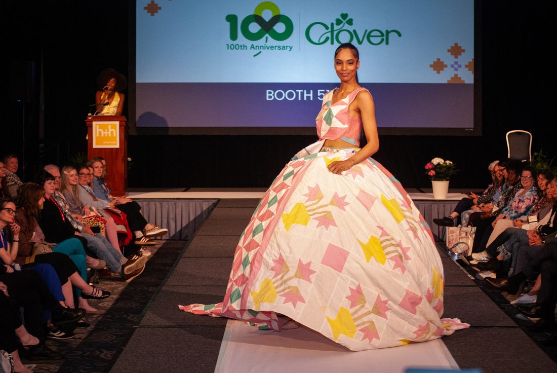 A quilted gown twirling on the runway